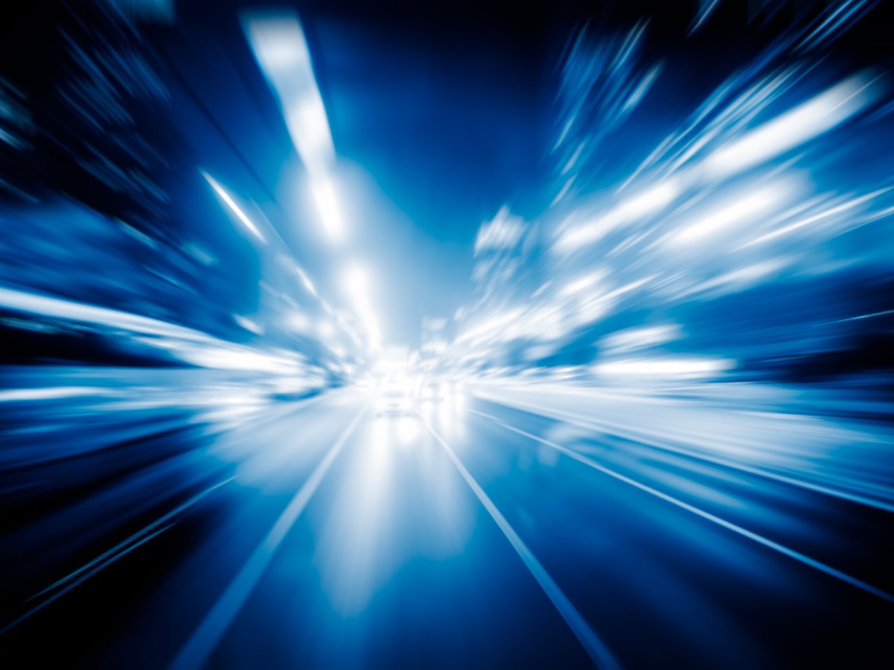 https://roadtracker.asia/wp-content/uploads/2025/05/blurred-traffic-light-trails-road-night-1280x960.jpg
